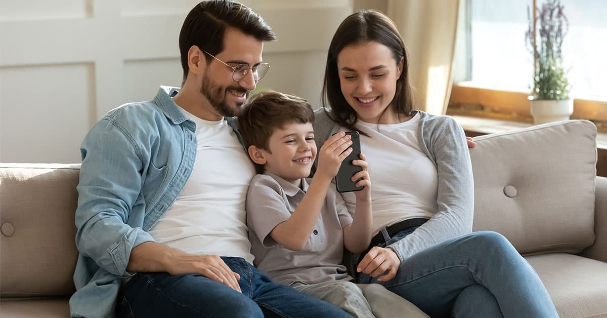 Parent and child using +AI on a phone